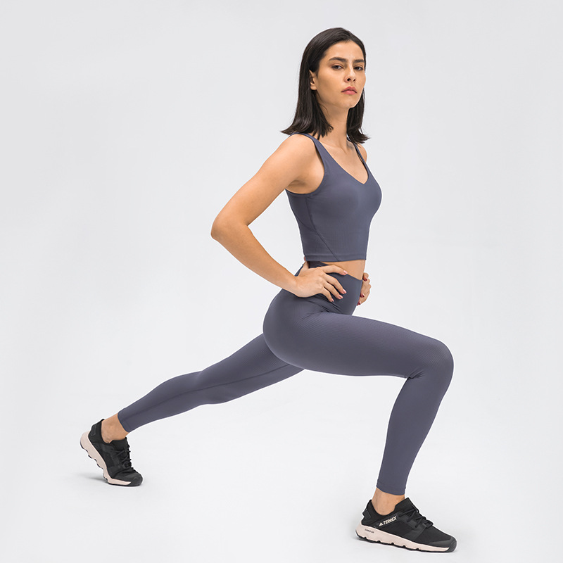 Conjuntos de yoga de cintura alta personalizados para mujeres Leggings sin costuras de 2 piezas Control de barriga Entrenamiento Correr Butt Push Up con tops deportivos