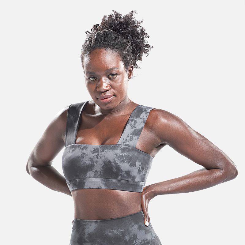 Las mujeres personalizan la venta caliente sin costuras Sujetador deportivo de entrenamiento al por mayor Gimnasio Running Athletic Fitness Open Back Sport Yoga Bras